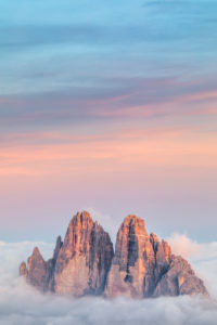 Tre Cime di Lavaredo emerging from the sea of clouds, Sexten Dolomites, South Tyrol, Bolzano, Italy, Europe Tre Cime di Lavaredo emerging from the sea of clouds, Sexten Dolomites, South Tyrol, Bolzano, Italy, Europe
